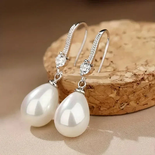 Evelyn Rose Jewelry Bright Pearl Dangling White Gold Earrings